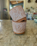 Terra Cotta Pottery With White Leaf Design