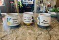 White/Gray Pottery With Plant Quotes